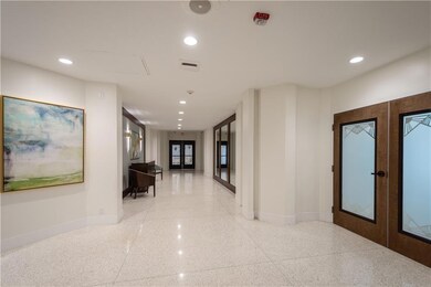 Lobby hallway to meeting room, elevators, beach