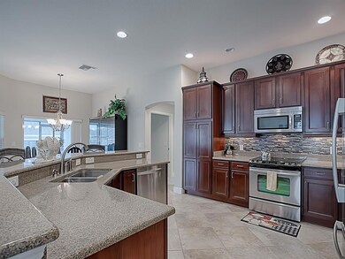 Kitchen has pantry cabinet.