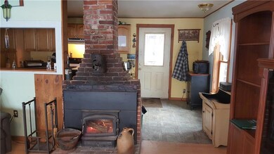 Center Fireplace with Wood Insert!