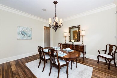 Dining room w/10' ceilings and plantation shutters