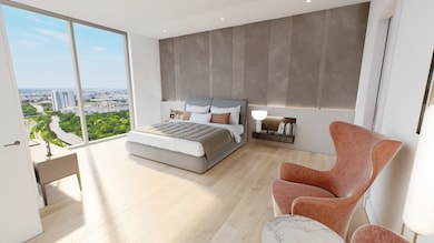 Escape to the luxurious primary bedroom retreat. T