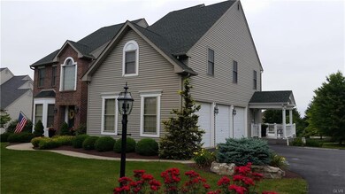 Three car spacious garage,  oversized side door en