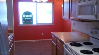 Through Kitchen to Dining Area