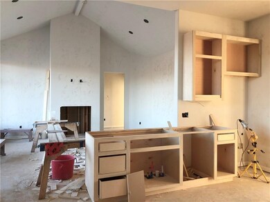 In kitchen looking into living area