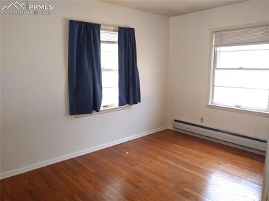 Large main bedroom filled with light.
