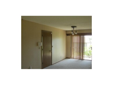 Door leading to double garage.  House has security