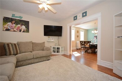 Large living room with charming pocket doors to th