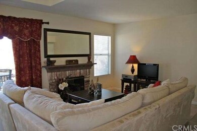 Comfy, spacious family room centered around a bric