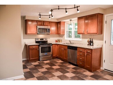 Stainless steel appliances in the remodeled kitche