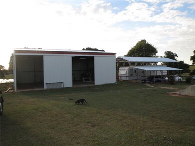 Wow!  30X40 Metal Shop building with 12 sliding do