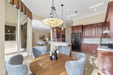 Dining space featuring crown molding