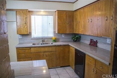 A nice kitchen with Granite counters and wood cabinetry.