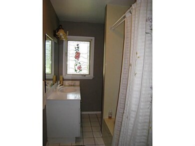 Bathroom. Main Bathroom with fiberglass tub/shower