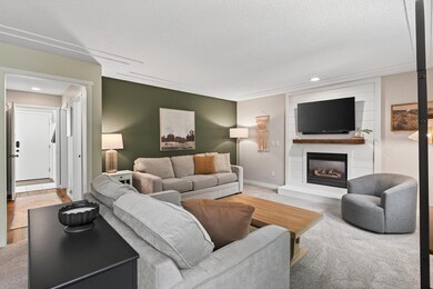 Custom fireplace surround.  Freshly painted.  Newer carpet.