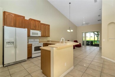 Open kitchen facing dining/great room