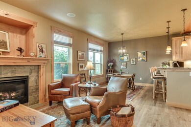 A view of the living area, dining area and the bre