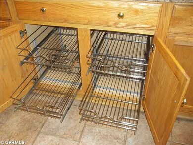 Kitchen - Cabinets have pull out drawers.