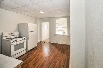 Kitchen has eat-in area and laundry room is in the