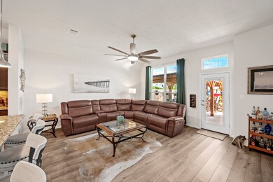 Living area with wood-finished flooring