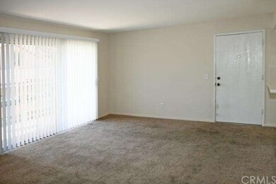 Living Room has Slider to Balcony