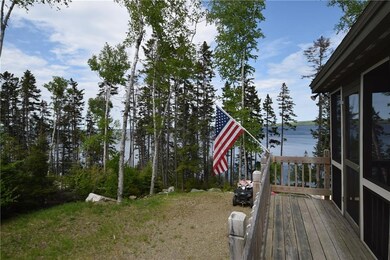 Side view of cottage with porch...