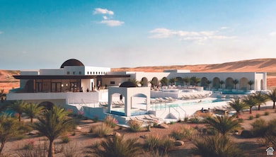 Community pool featuring a patio and a mountain view