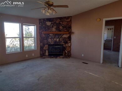 Large open living room with fireplace