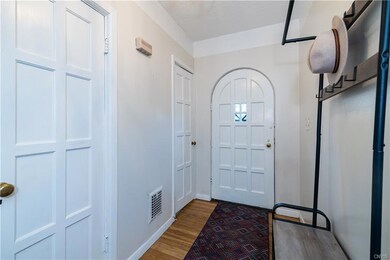 8 Panel Solid Wood Doors and hardwood floors throu