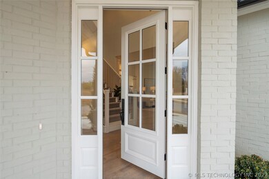 Welcome!  Come in to a two-story Entry, filled wit