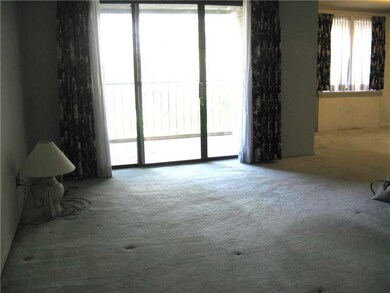 Living Room. Wall to wall carpeting, patio door to