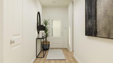 Entryway featuring light hardwood / wood-style flo
