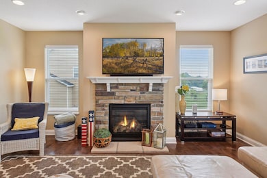 Featuring a cozy fireplace