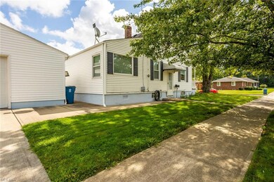 View of front of property with a front yard