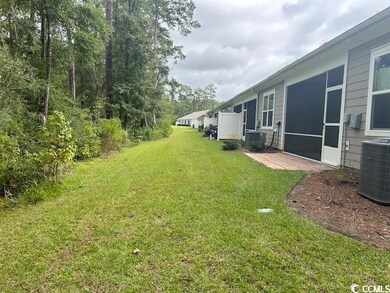 View of yard with central AC