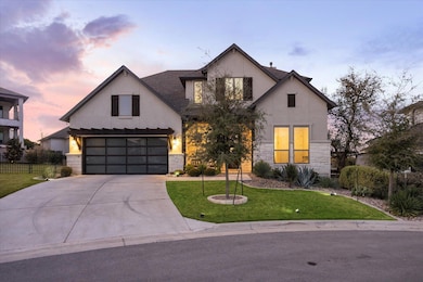 View of front of property featuring fence, stucco