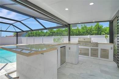 View of patio featuring Custom Marble built in Bar