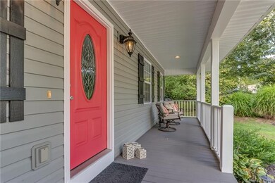 Front porch spans the entire front of the home.