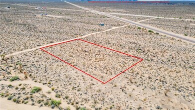 Aerial view of sparsely populated area with a dese