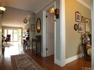 Foyer into living room looking out to backyard