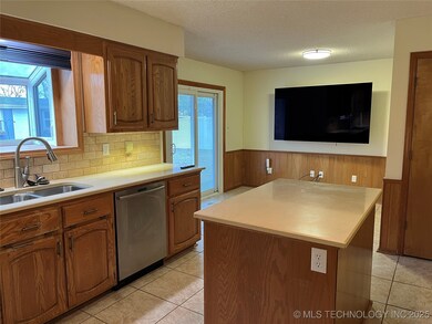 Kitchen with TV in breakfast nook