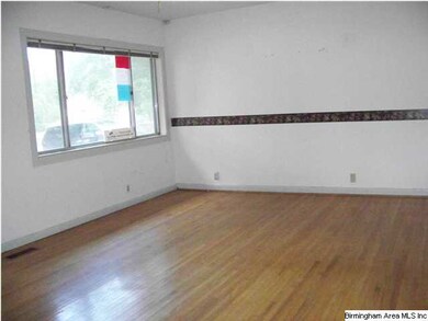 Living Room with hardwoods and big picture window