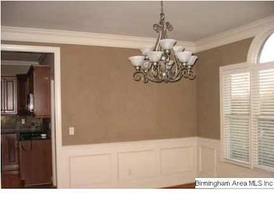 Spacious Formal Dining Room Enhanced with Beauty M