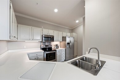 Notice under-cabinet lighting and all white counte