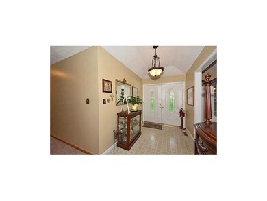 Inviting Entryway w/updated lighting & double door