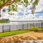 Gorgeous lake view. Well maintained lawn. Fenced s