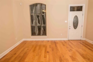 ON THE OTHER END OF THE DEN IS THE DINING AREA.  T