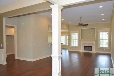 The great room is completely open to the kitchen a