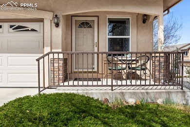 Doorway to property with stucco siding