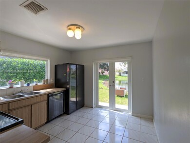 Sliding door goes to patio. Lakefront view.