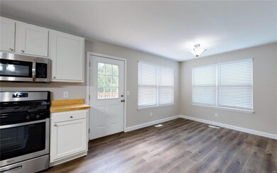 Light and Bright Breakfast room w new windows and 